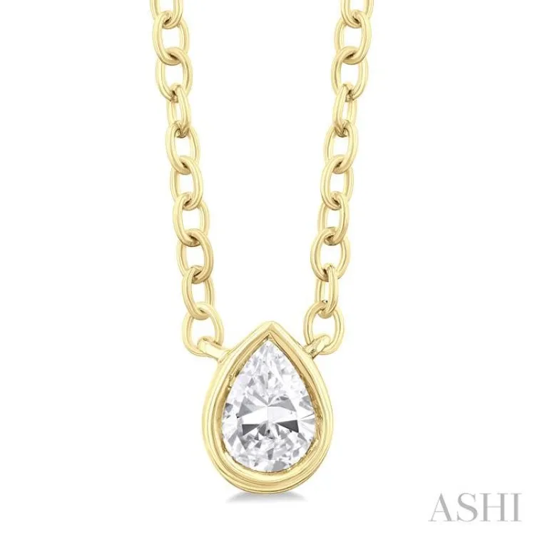 1/6 ctw Petite Bezel Set Pear Cut Diamond Fashion Pendant With Chain in 10K Yellow Gold