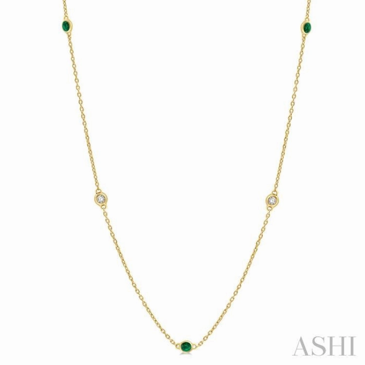 1.75 MM Emerald and 1/6 Ctw Round Cut Diamond Precious Station Necklace in 14K Yellow Gold