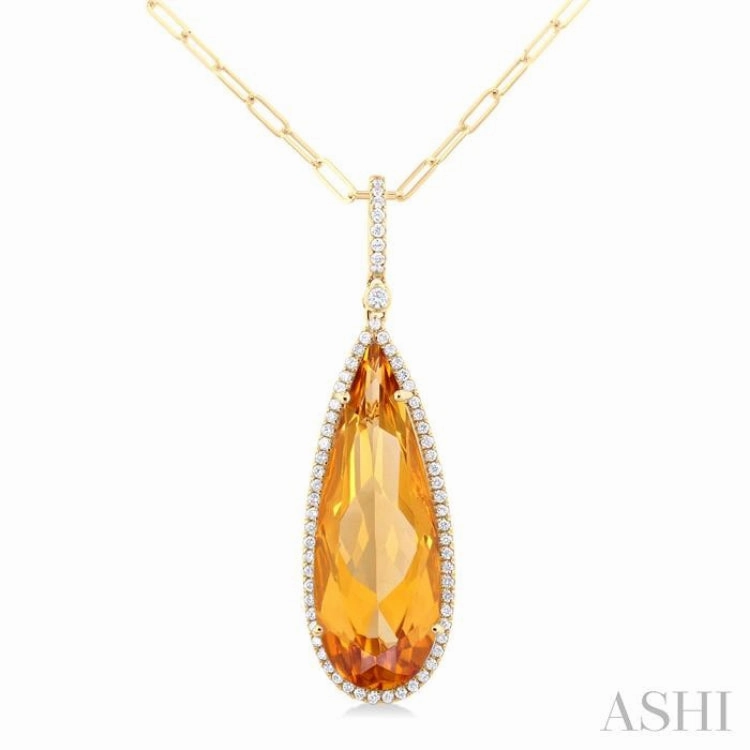 26x9 MM Pear Cut Citrine and 1/4 Ctw Round Cut Diamond Halo Semi-Precious Pendant With Chain in 14K Yellow Gold