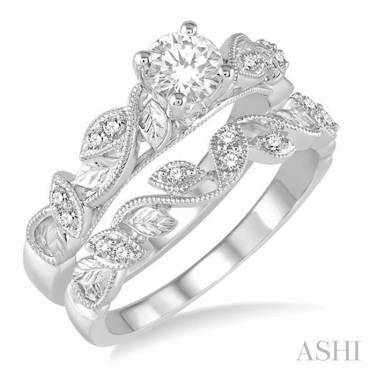 3/8 ctw Diamond Wedding Set With 1/3 ctw Round Center Diamond Leaf Motif Engagement Ring and 1/10 ctw Leaf Motif Wedding Band in 14K White Gold