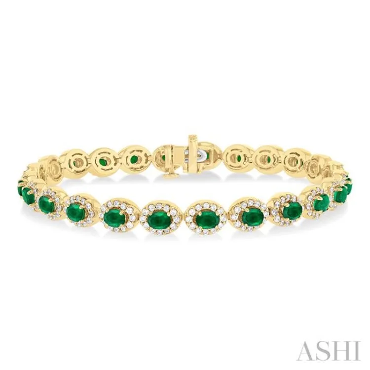 4X3 MM Oval Cut Emerald and 2 1/6 ctw Round Cut Diamond Halo Precious Bracelet in 14K Yellow Gold