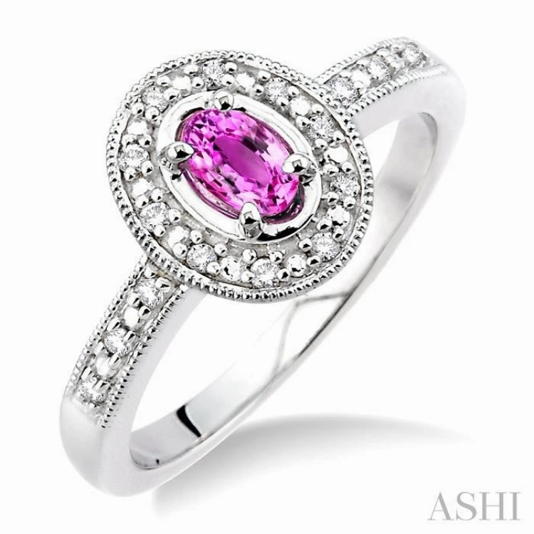 5x3 MM oval cut Pink Sapphire and 1/10 Ctw Single Cut Diamond Ring in 14K White Gold.