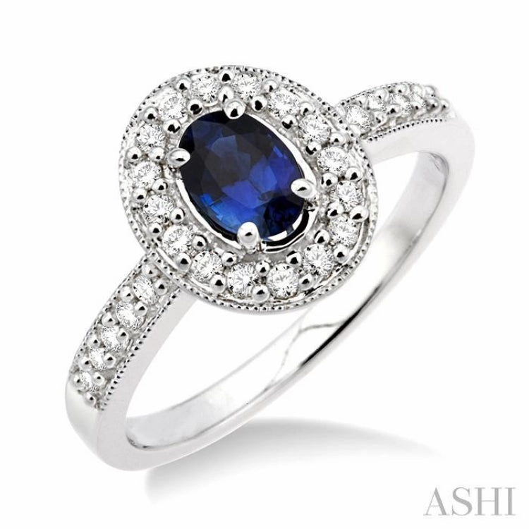 6x4 MM Oval Cut Sapphire and 1/4 ctw Round Cut Diamond Ring in 14K White Gold