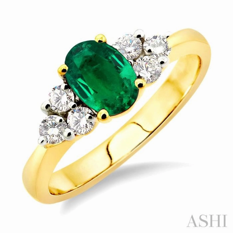 7x5mm Oval Cut Emerald and 1/3 ctw Round Cut Diamond Ring in 14K Yellow Gold