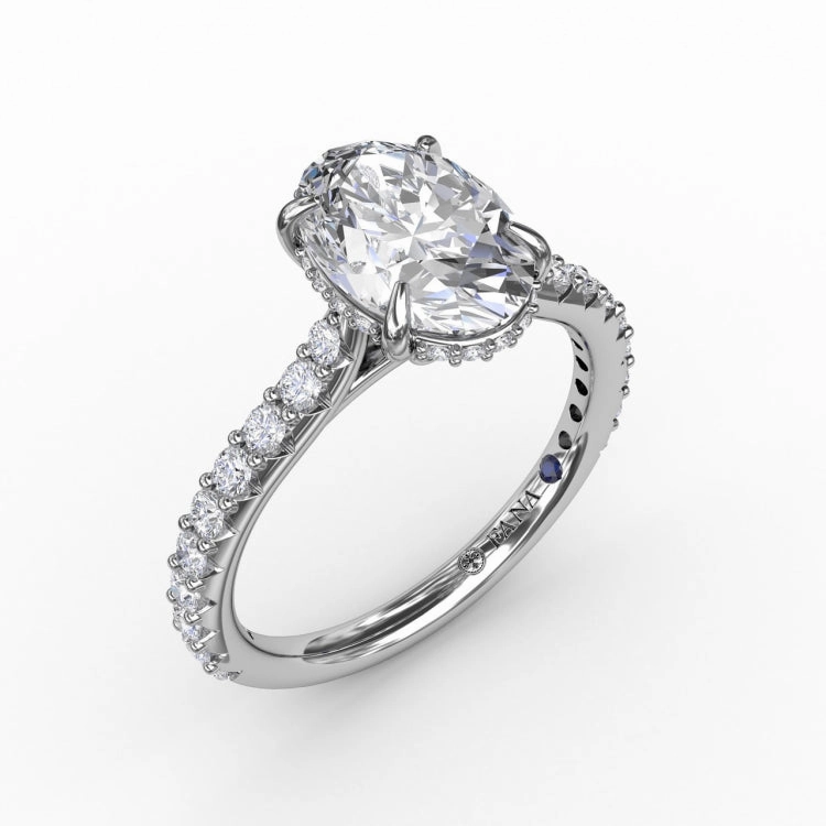 Classic Oval Diamond Solitaire Engagement Ring With Hidden Pav Halo