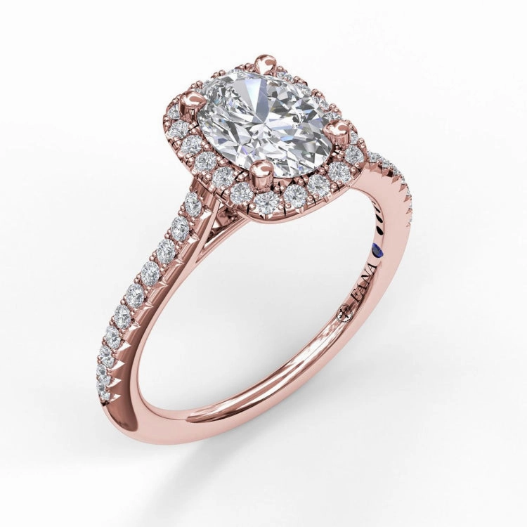 Oval Center Diamond With Cushion Halo Engagement Ring